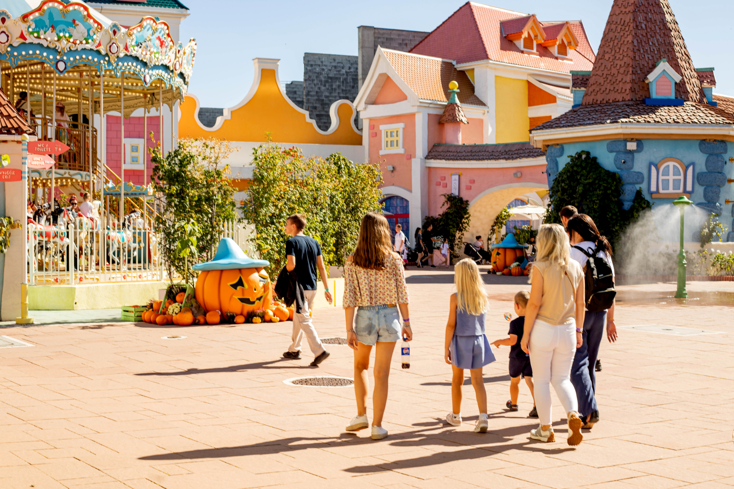 Fairytale-themed area and carousel streets Colourful fairytale-style zone at Energylandia with carousel and family walkway.